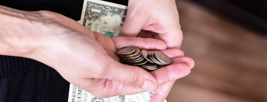 Woman's Hands Holding Money