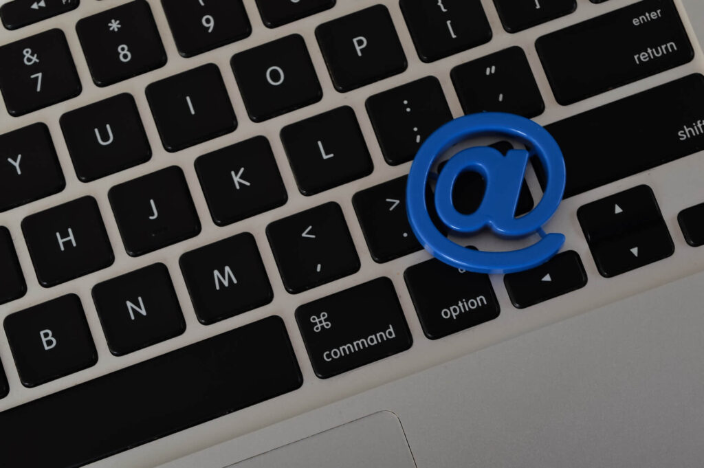 Computer keyboard with mail symbol on keys