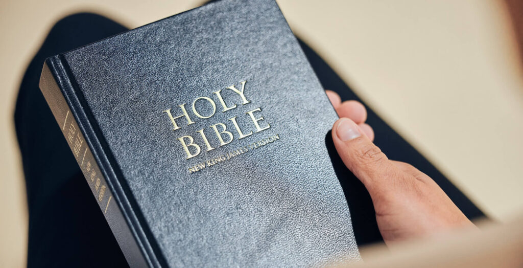 Hands Holding Bible